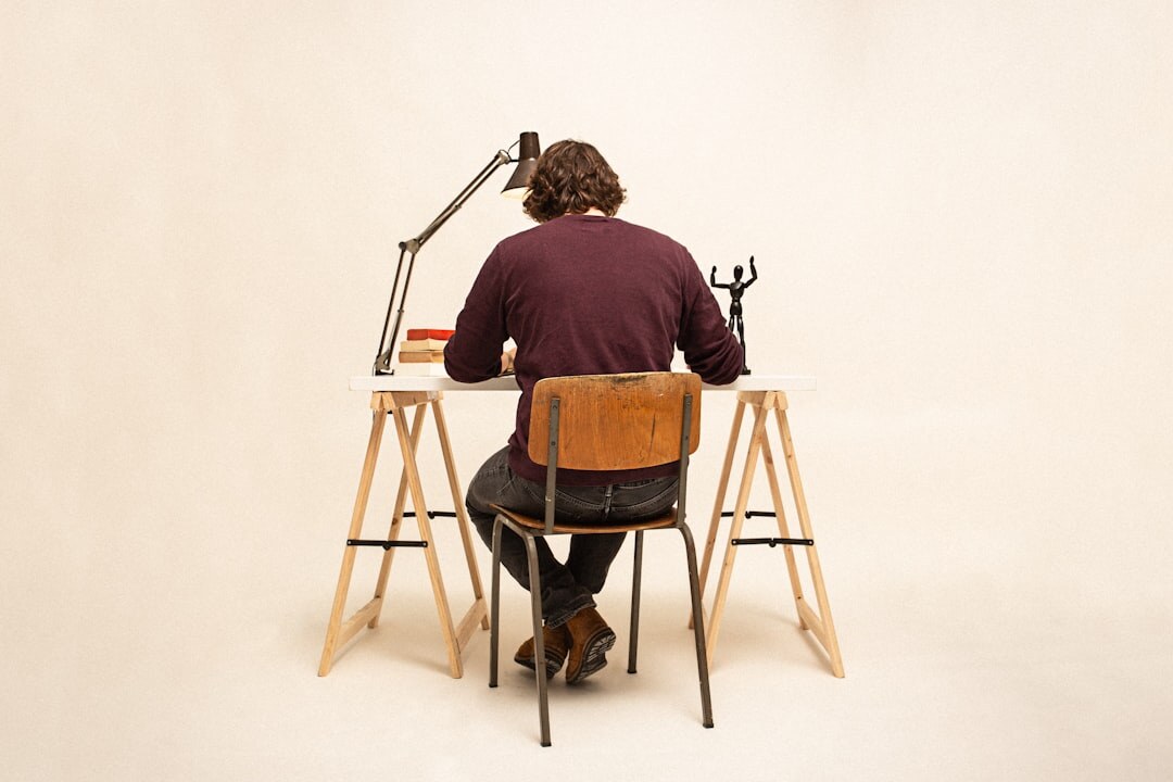 mystery author writing at desk