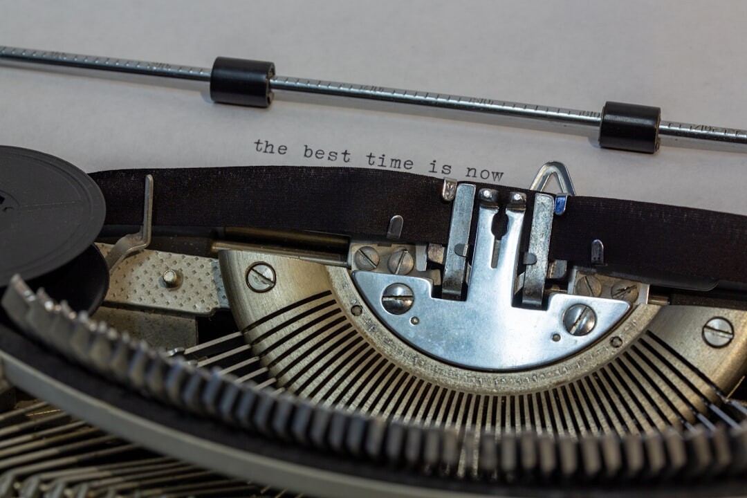 Close up of typewriter keys with a sheet of paper